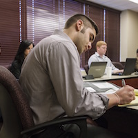 Students work on accounting project.