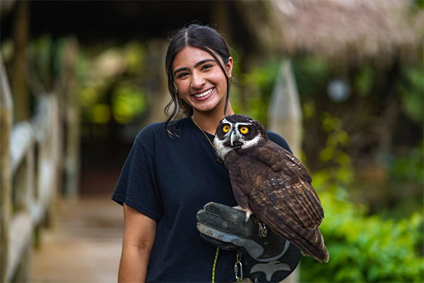 Hiba Ali with an owl