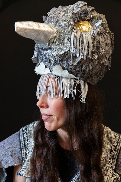 Pippin Frisbie-Calder in elaborate headpiece